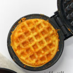 Cooked Chaffle on a black Dash Mini Waffle Maker