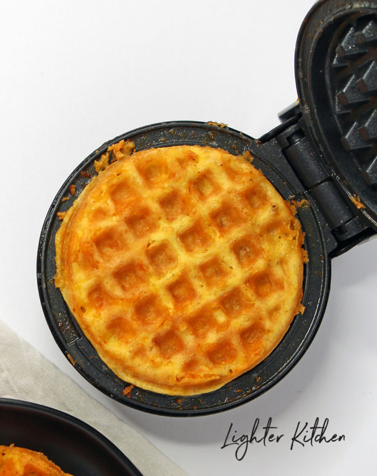 Cooked Chaffle on a black Dash Mini Waffle Maker