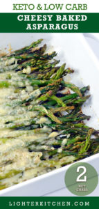 Baked Asparagus with Parmesan in a white baking dish.
