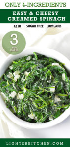 Creamed spinach in a white bowl on a white napkin.