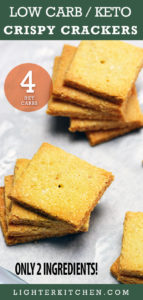 Baked Keto Crackers on parchment paper lined silver baking sheet.