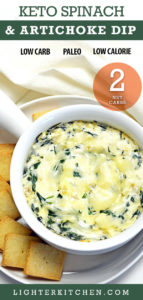 Baked Keto Spinach Dip in a white soup bowl. Rests on a white plate with keto crackers.
