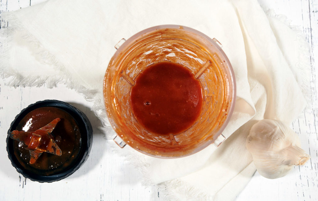 Top down view of whole30 bbq sauce in a ninja personal blender.